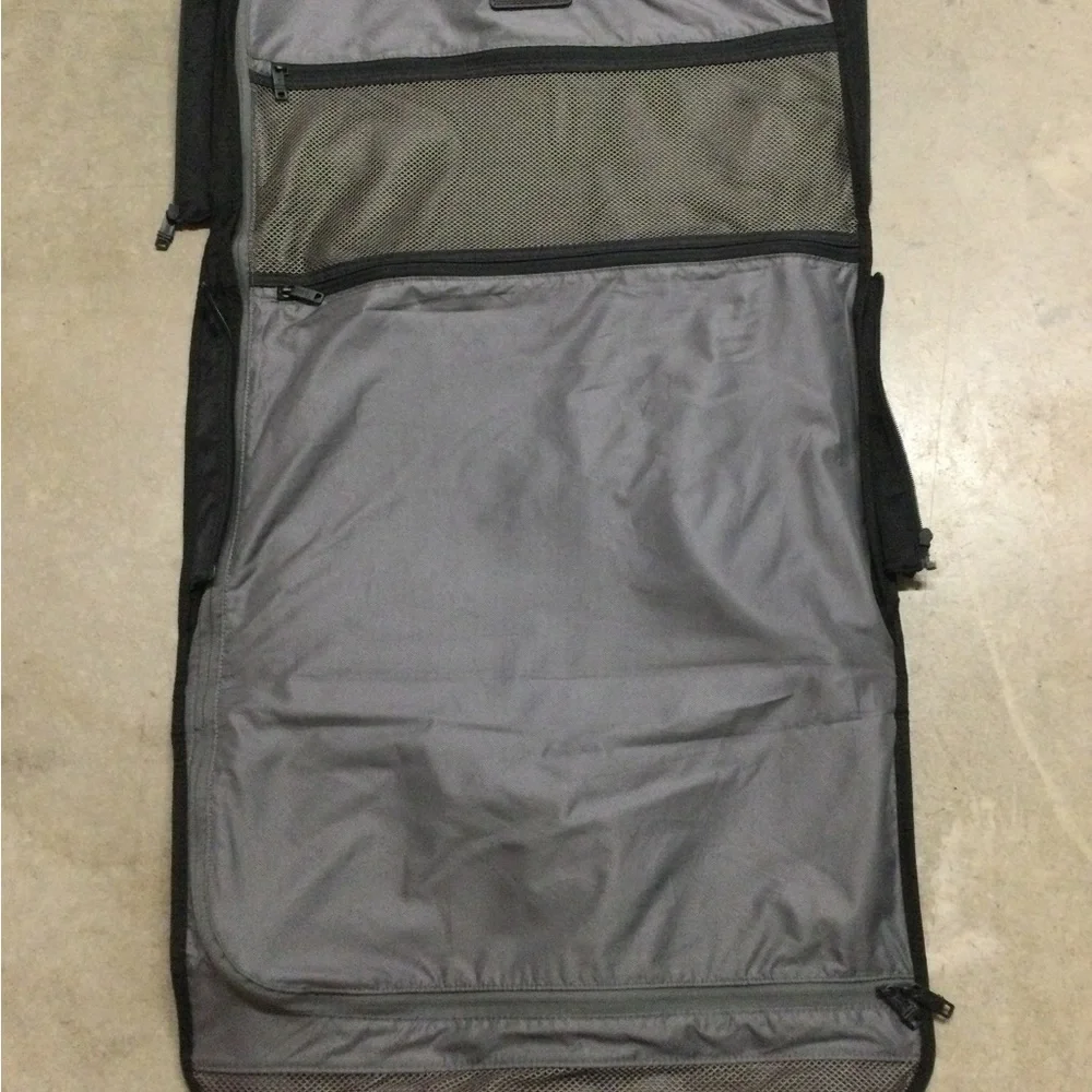 Tumi Black Men's Travel Duffel with Front Zip Pocket and Carry Handles
